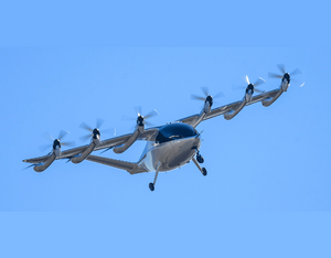 Maker has 12 propellers attached to six booms on a fixed wing. Archer Image