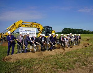Helmets and shovels lined up for the groundbreaking ceremony for the National Advanced Air Mobility Center of Excellence on day two of the National Advanced Air Mobility Industry Forum at Springfield-Beckley Municipal Airport, Aug. 23, 2022. Dennis Stewart for U.S. Air Force Photo