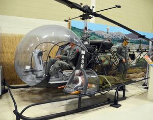 Among the displays at the AHMEC is a depiction of a US Army H-13 helicopter (Bell Model 47) that has airlifted a wounded soldier to a M.A.S.H. unit in the Changjin area of Korea, circa 1950. AHMEC Photo