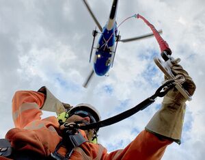 Boost Systems offers the only FAA approved personnel carrying device system with insulated suspension lines and flash rated harnesses for utility HEC operators. Boost Photo