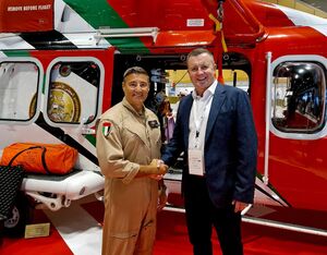 HE Maj General Dr. Stephen A. Toumajan, general manager, NSRC (left) with Andrew Munro, director of Smith Myers in front of the NSRC Leonardo AW139 that will deploy Smith Myers Artemis mobile phone detection, location, and communication system. Smith Myers Photo