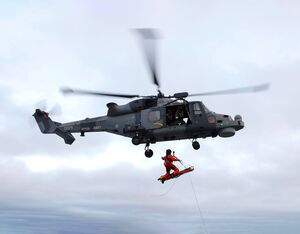 British Armed Forces conducting winching drills with a Wildcat helicopter. Crown Copyright Photo