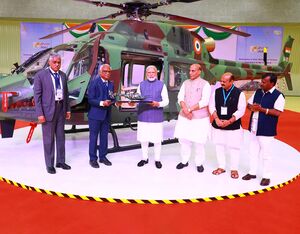 Indian Prime Minister unveils a Light Utility Helicopter (LUH) produced by HAL at the company’s new Tumakuru factory. HAL Photo