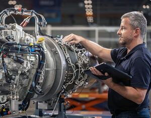 A Safran Helicopter Engines engineer inspects an Arrano engine. The Arrano powers the Airbus H160. Adrien Daste/Safran Photo