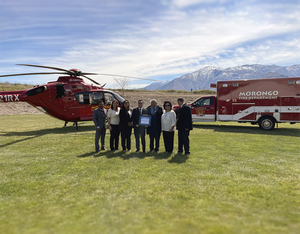 Officials from the Morongo Band of Mission Indians and Global Medical Response at the launch ceremony for the new Morongo air and ground ambulance program. (left to right) Morongo Fire Chief Jason Carrizosa, Morongo Chief Executive Officer Titu Asghar, Morongo Tribal Council Members Jeanette Burns, Mary Ann Andreas, and Teresa Sanchez, Morongo Tribal Chairman Charles Martin, and Samuel Flores, Donnie Wharton, Philip Forgione and Jeremey Shumaker of Global Medical Response. The Morongo Band of Mission Indians