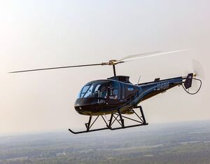 An Enstrom 480B helicopter, in flight. Enstrom Photo