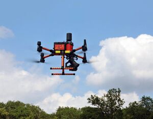 A fire department drone equipped with a thermal imaging camera and loudspeaker flies over a German training area during a fire drill on June 24. (Karl-Josef Hildenbrand/picture alliance via Getty Images)