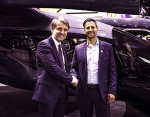 Safran CEO, Franck Saudo, and Archer founder and CEO, Adam Goldstein at Paris Air Show in front of Archer’s Midnight Aircraft — credit: Archer