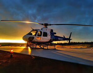 An Airbus H125 helicopter from Native Air rests on the tarmac. Air Methods Photo