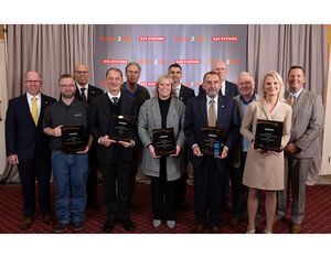 The Donaldson Company was awarded the BAE Systems Partner2Win Bronze Medallion. Lisa Evans, director of aerospace & defense (front row, far right) accepted on behalf of the company, alongside BAE representatives and other supplier recipients. Donaldson Photo