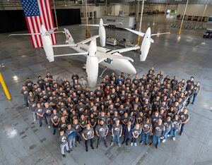 Overair employees celebrate the completion of their first full-scale prototype - Overair Photo