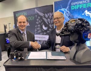 Representative from ASU and SAF sign the agreement at HAI Heli-Expo on Jan. 28. Dayna Fedy Photo
