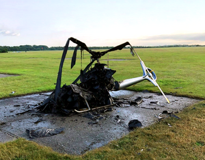 The investigation into a Guimbal Cabri G2 helicopter that caught fire in July 2019 found that the fire was caused by an electrical short circuit in the engine compartment. AAIB Photo.