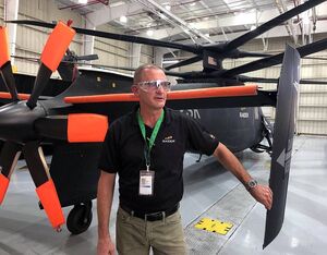 Sikorsky chief test pilot Bill Fell at the tail end of the S-97 Raider at Sikorsky’s test flight facility in West Palm Beach, Florida. Dan Parsons Photo