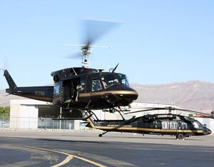 U.S. Customs and Border Protection’s final UH-1N ‘Huey’ helicopter hovers in front of its replacement, the UH-60 Black Hawk, as it begins its final operational mission with Air and Marine Operations, El Paso Air Branch, July 29, 2020, marking the end of the helicopters’ illustrious career supporting CBP law-enforcement operations across the nation. (U.S. Customs and Border Protection photo by Greg L. Davis)