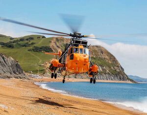 One of HeliOps’ Sea Kings, ZA166, providing SAR training to the Federal German Navy (FGN) student pilots, seen here on a beach landing, for students nearing the end of their course. (Greg Caygill photo)